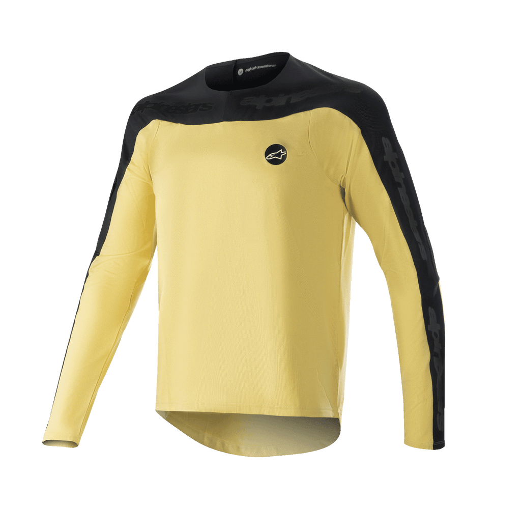 Alpinestars Drop Meta Long Sleeve Jersey, koszulka rowerowa MTB, złoto-czarna, czarny karczek na ramionach i zewnętrzne panele rękawów, małe okrągłe logo na piersi, lekka oddychająca tkanina siateczkowa, przedłużony tył