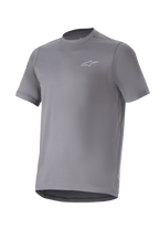 Alpinestars A-Dura Astar Jersey, koszulka rowerowa z krótkim rękawem, ciemnoszara, małe srebrne logo na piersi, okrągły dekolt i przedłużony tył, materiał odprowadzający wilgoć, jazda po szlakach MTB
