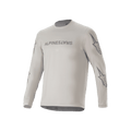 Koszulka Alpinestars A-Dura Switch Long Sleeve Jersey, jasnoszara koszulka rowerowa MTB, napis na klatce piersiowej i logo gwiazdy na rękawach, odzież rowerowa do jazdy po szlakach