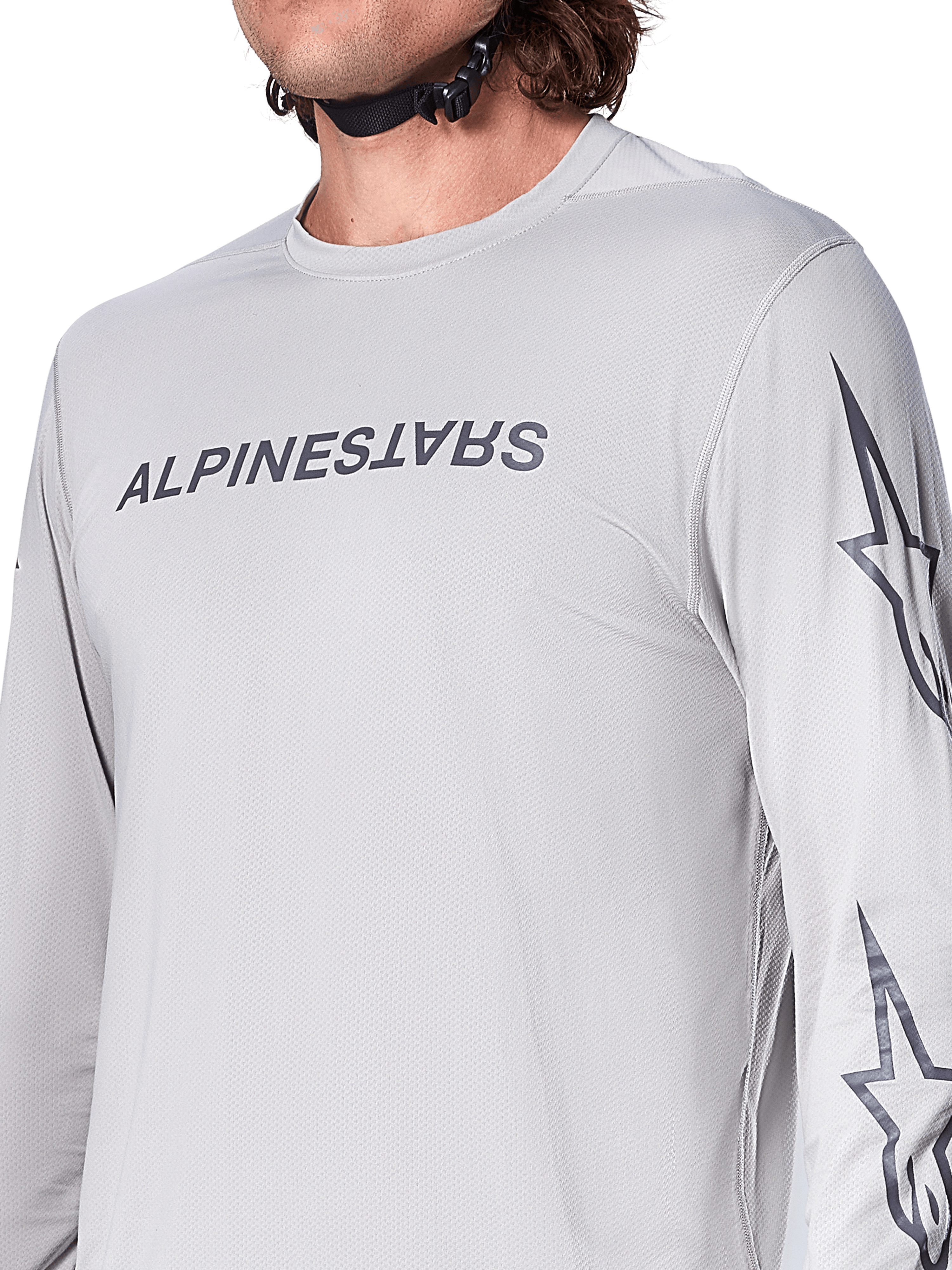 Alpinestars A-Dura Switch Jersey - Long Sleeve, jasnoszara koszulka rowerowa MTB z ciemnoszarym napisem na piersi i logo gwiazdy na rękawie, oddychająca żakardowa tekstura, wydajna odzież rowerowa do jazdy po szlakach