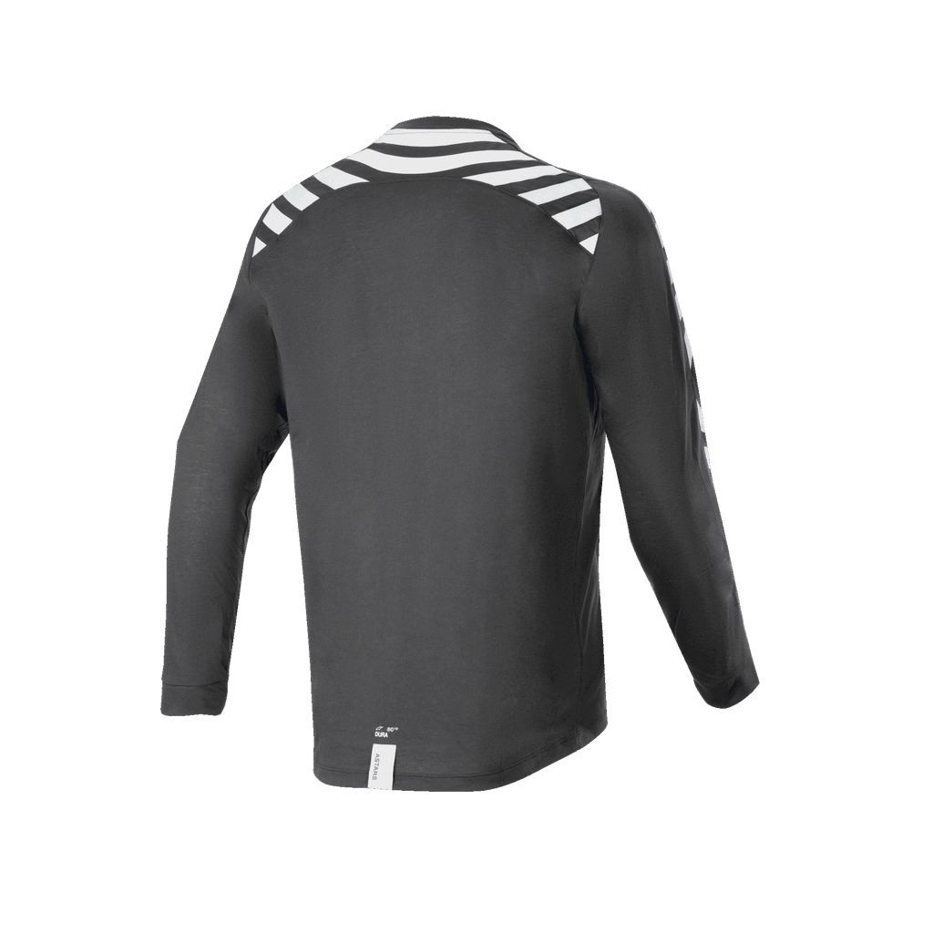 Alpinestars A-Dura Dri Oscar Long Sleeve Jersey, Black Reflective, widok z tyłu z białymi odblaskowymi paskami na ramionach i rękawach, techniczny materiał drirelease® z recyklingu, przedłużony tył do jazdy terenowej