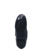 Buty Alpinestars Tech 10, widok podeszwy, czarne z białym logo, teksturowany wzór przyczepności, wymienna wkładka centralna, profesjonalne obuwie motocrossowe