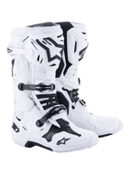 Buty motocrossowe Alpinestars Tech 10, białe z czarnymi akcentami, wytrzymała konstrukcja o wysokim kroju z potrójnym systemem klamer, ochrona skorupy TPU i zaawansowana kontrola zgięcia, profesjonalne obuwie wyścigowe off-road