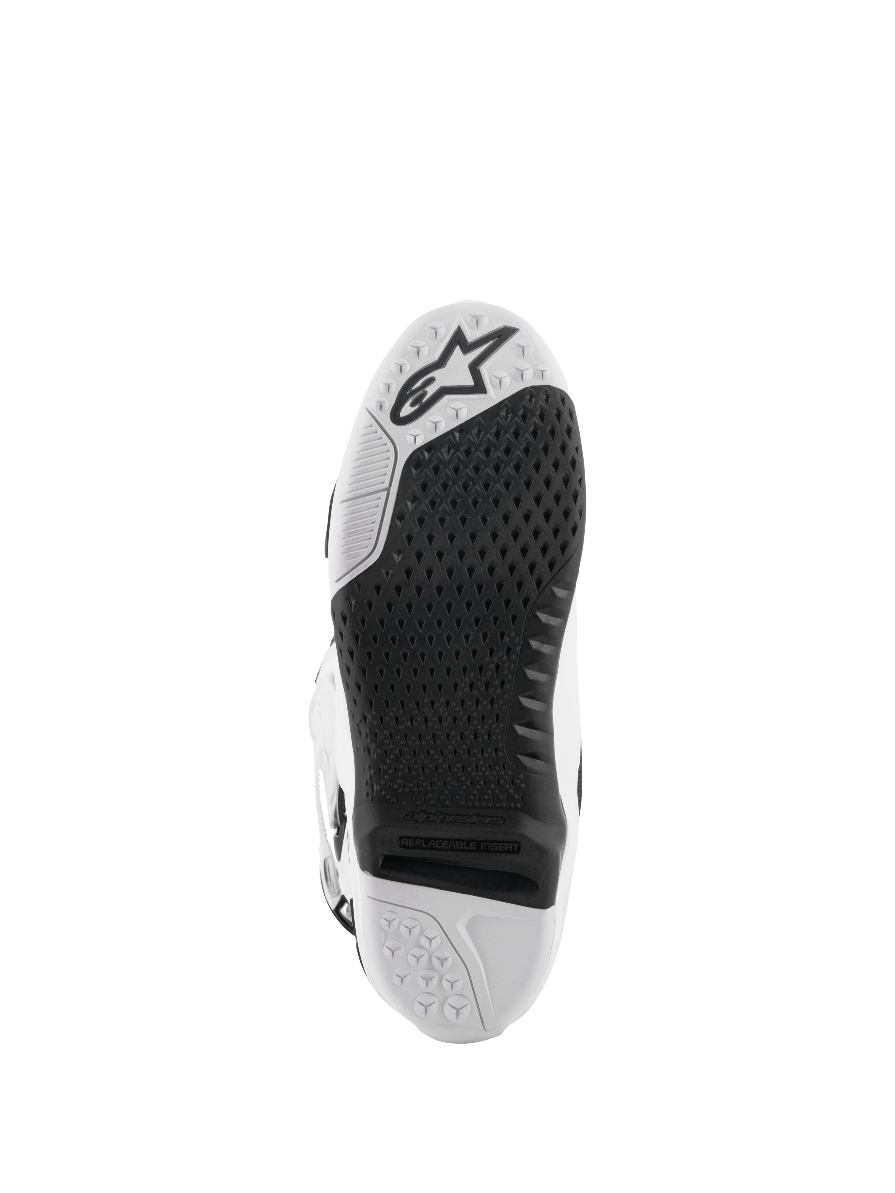 Buty Alpinestars Tech 10, buty motocrossowe, biało-czarne, widok od dołu na podeszwę z teksturowanym wzorem przyczepności, logo Alpinestars i wymienną wkładką centralną do wyścigów off-road