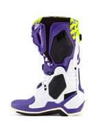 Buty Alpinestars Tech 10 Dirt Studios® LE, buty motocrossowe, białe, fioletowe i żółte neonowe, widok z boku prezentujący biało-fioletowy szkielet TPU, neonowo żółtą górę z grafikami gwiazd, czarne panele o teksturze plastra miodu oraz profesjonalny design wyścigowy off-road