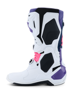 Buty Alpinestars Tech 10, buty motocrossowe, białe z fioletowymi, granatowymi i neonowo-różowymi akcentami, profil boczny z białą konstrukcją, ochronnymi panelami TPU i smukłym designem do jazdy terenowej