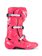 Buty Alpinestars Tech 10, buty motocrossowe, różowo-białe, potrójny system klamer, ochrona z certyfikatem CE, teksturowany geometryczny design z białym logo gwiazdy i czarna wytrzymała podeszwa