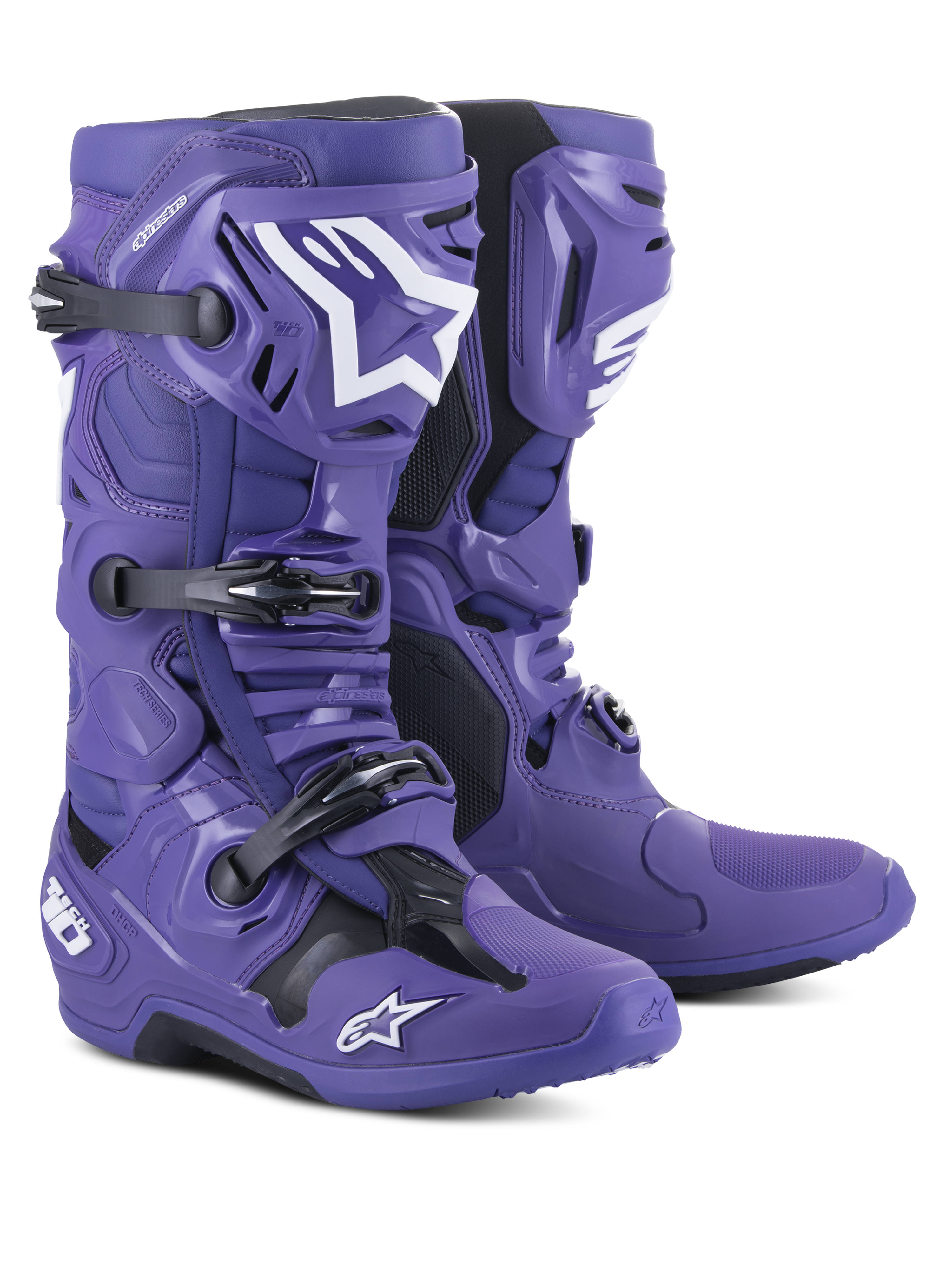 Buty motocrossowe Alpinestars Tech 10, fioletowe (Ultraviolet Purple) z czarnymi i białymi akcentami, system potrójnych klamer, ochronna skorupa TPU, logo gwiazdy Alpinestars, wysokowydajne obuwie wyścigowe off-road