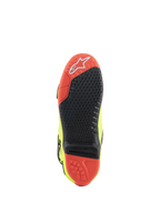 Buty Alpinestars Tech 10, buty motocrossowe, żółty fluo czarny czerwony fluo, widok podeszwy wykonanej z czerwono-czarnego dwuskładnikowego materiału, wymienna centralna wkładka zwiększająca przyczepność oraz wypustki trakcyjne zapewniające wydajność w terenie