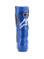 Buty Alpinestars Tech 10, niebieskie i czarne, widok z tyłu z białym logo gwiazdy i detalami klamry, wysokowydajne obuwie motocrossowe do wyścigów terenowych