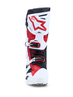Buty Alpinestars Tech-10, męskie buty motocrossowe, białe i czerwone, certyfikowane CE, widok z przodu na klamry i ochraniacz piszczeli.
