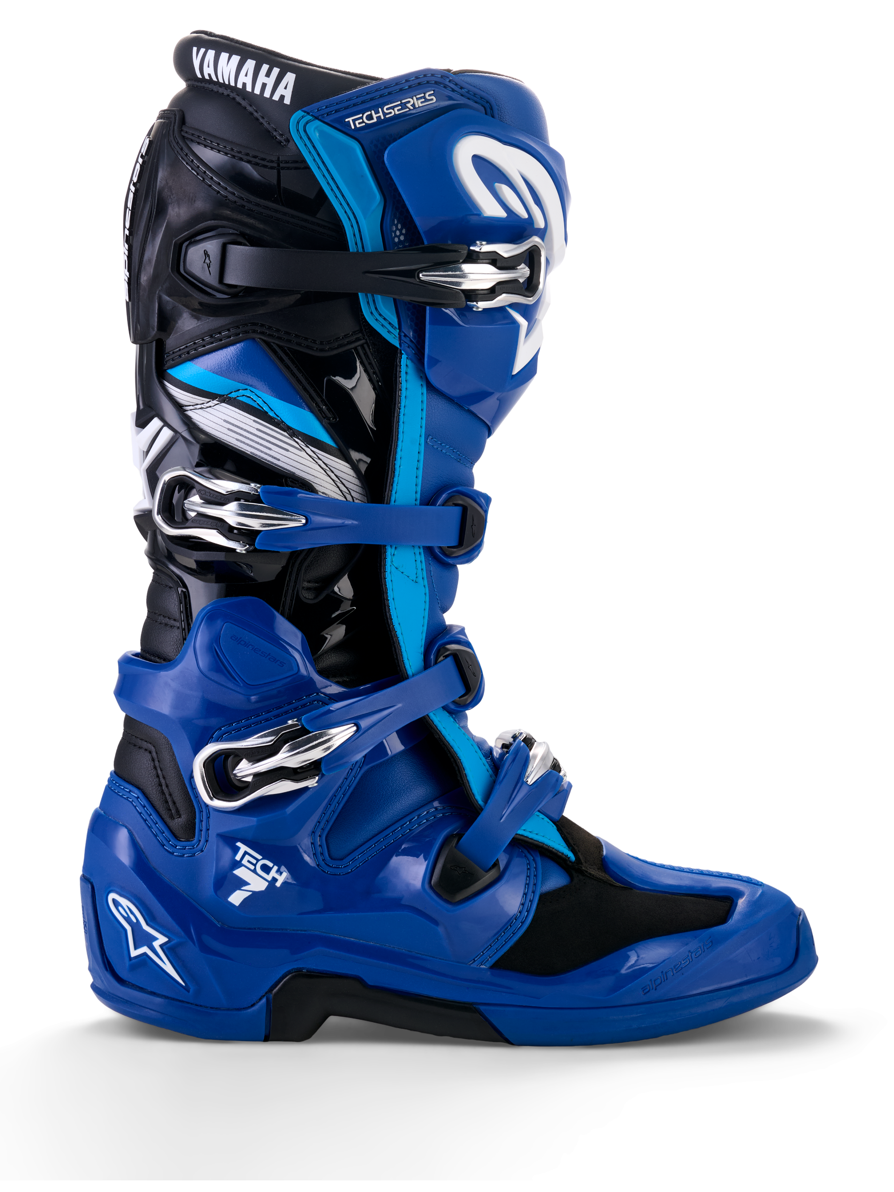 Alpinestars Yamaha Tech 7, buty motocrossowe, niebieskie z czarnymi i białymi akcentami, profil boczny z czterema regulowanymi klamrami, wzmocniona ochrona TPU na goleni i pięcie, wyraźne logo Yamaha oraz wytrzymała podeszwa do jazdy terenowej