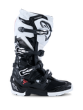 Alpinestars 2026 Tech 7 Enduro Boots, buty motocyklowe off-road, czarno-białe, cztery metalowe klamry, panele ochronne TPU o wysokiej odporności na uderzenia, wytrzymała podeszwa dwuskładnikowa, wyraźne logo Alpinestars na pięcie i goleni