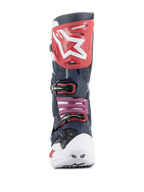 Buty Alpinestars Tech 10 Supervented, buty motocrossowe, Night Navy White Rainbow, widok z przodu z czerwoną płytą na piszczel z białym logo, białym wentylowanym noskiem oraz konstrukcją z granatowej perforowanej mikrofibry dla maksymalnej wentylacji.