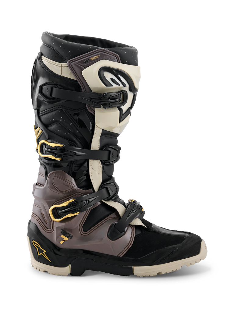 Alpinestars 2026 Tech 7 Enduro Drystar® Boots, Motocross and Enduro Boots, Black Dark Gray and Gold, featuring a multi-buckle closure system with gold accents, rugged dual-compound sole, and durable TPU protective panels, professional off-road riding footwear