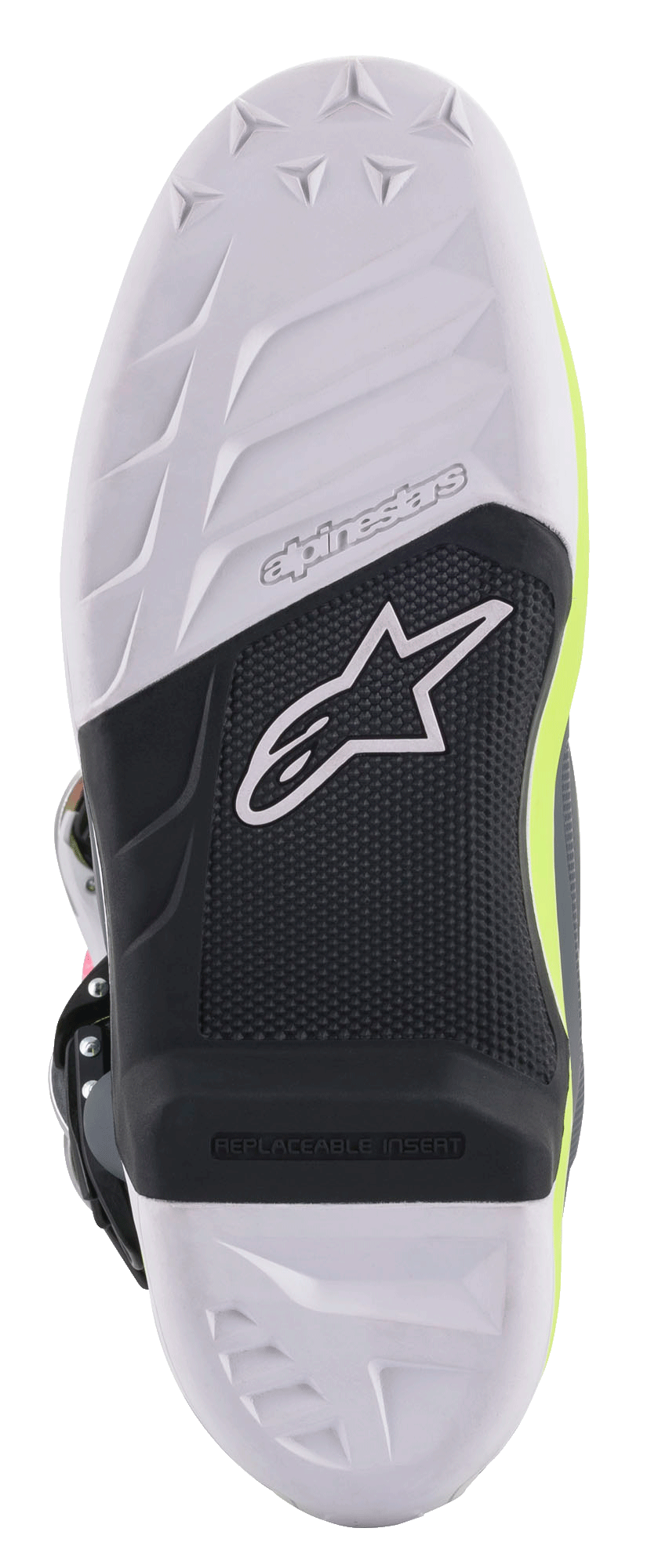 Buty Alpinestars Tech 7, buty motocrossowe, szczegółowy widok podeszwy z biało-czarną konstrukcją, wymienna wkładka na podnóżek, teksturowana powierzchnia z logo gwiazdy Alpinestars i neonowożółtymi akcentami