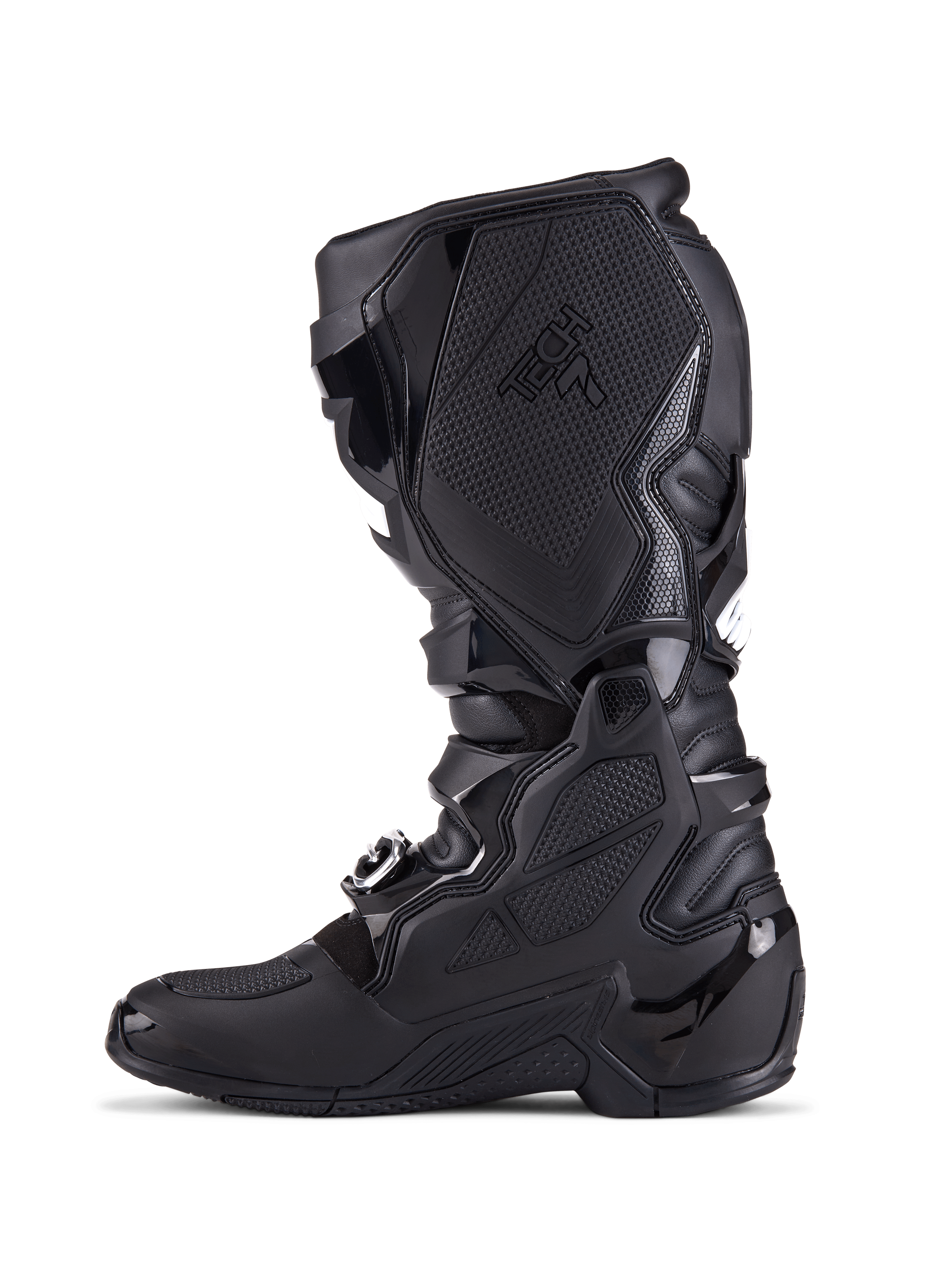 Buty Alpinestars Tech 7, buty motocrossowe, całe czarne, widok z profilu bocznego ukazujący płyty ochronne TPU, system zapięć na klamry i teksturowane panele przyczepne, profesjonalne obuwie do jazdy terenowej