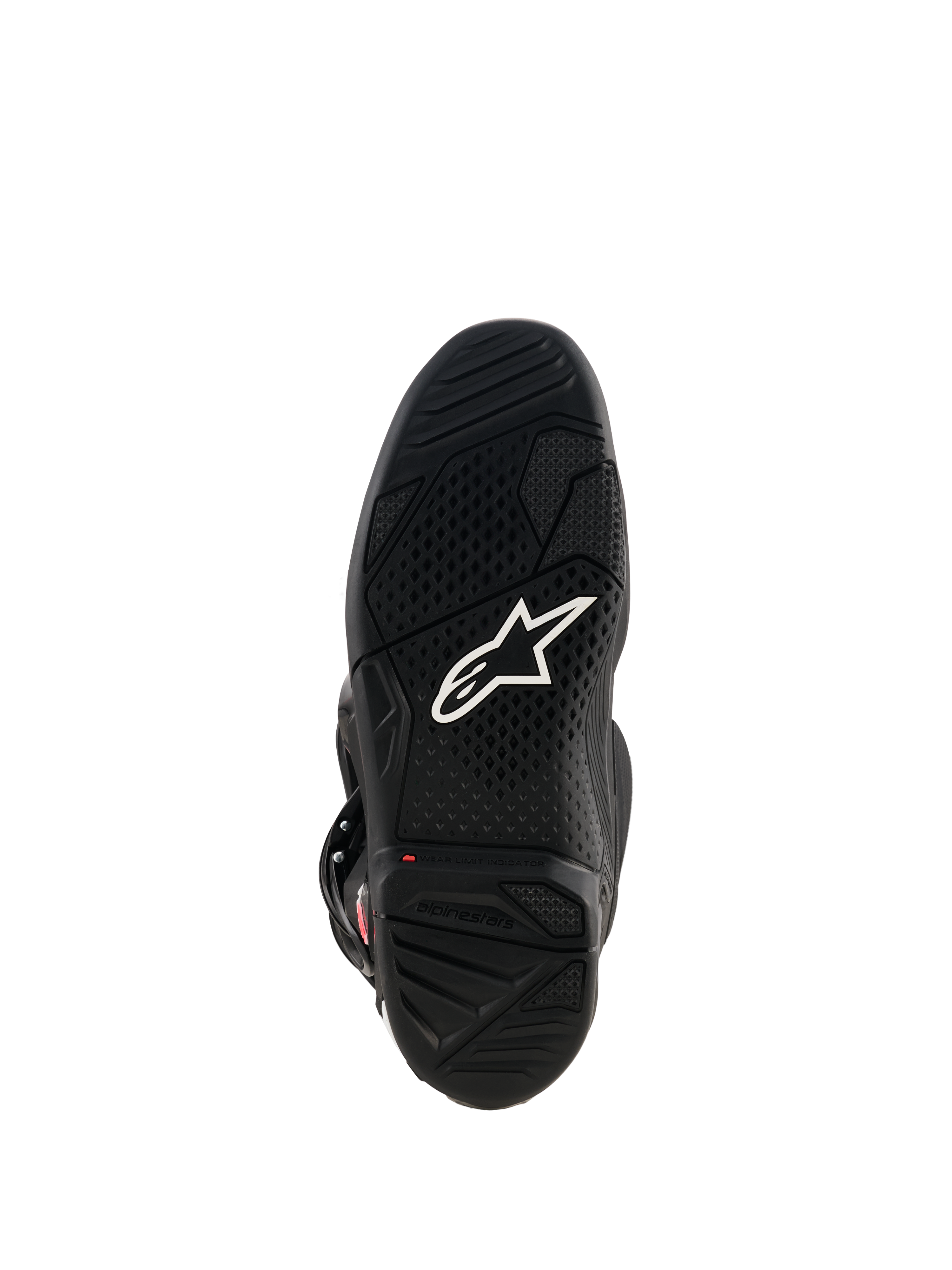 Buty Alpinestars Tech 7, widok czarnej gumowej podeszwy z białym logo Astar, teksturowanym wzorem bieżnika i czerwonym wskaźnikiem zużycia dla wydajności motocrossowej.
