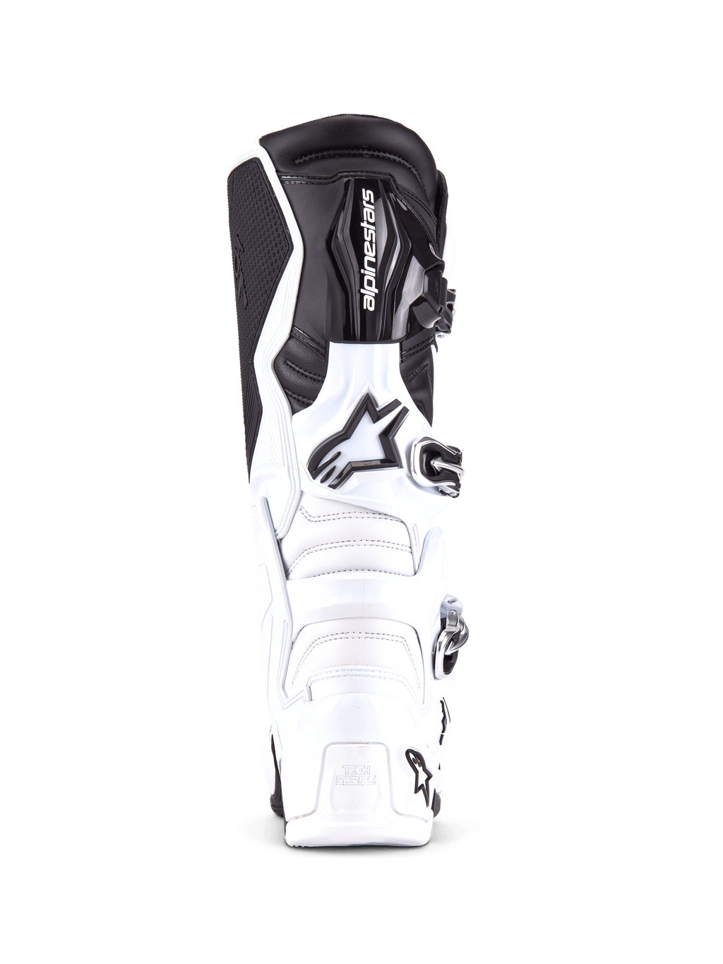Buty Alpinestars Tech 7, profesjonalne buty motocrossowe, biało-czarne, widok z przodu pokazujący wzmocnioną płytę piszczelową z logo Alpinestars, system zapięć na klamry i wytrzymałą konstrukcję TPU do jazdy w terenie