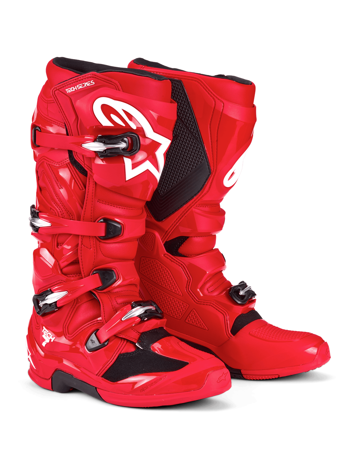 Buty Alpinestars Tech 7, buty motocrossowe, jaskrawoczerwone, z białym logo Astars na goleniu, srebrno-czarnym systemem klamer i ochronną skorupą TPU dla wydajności w terenie