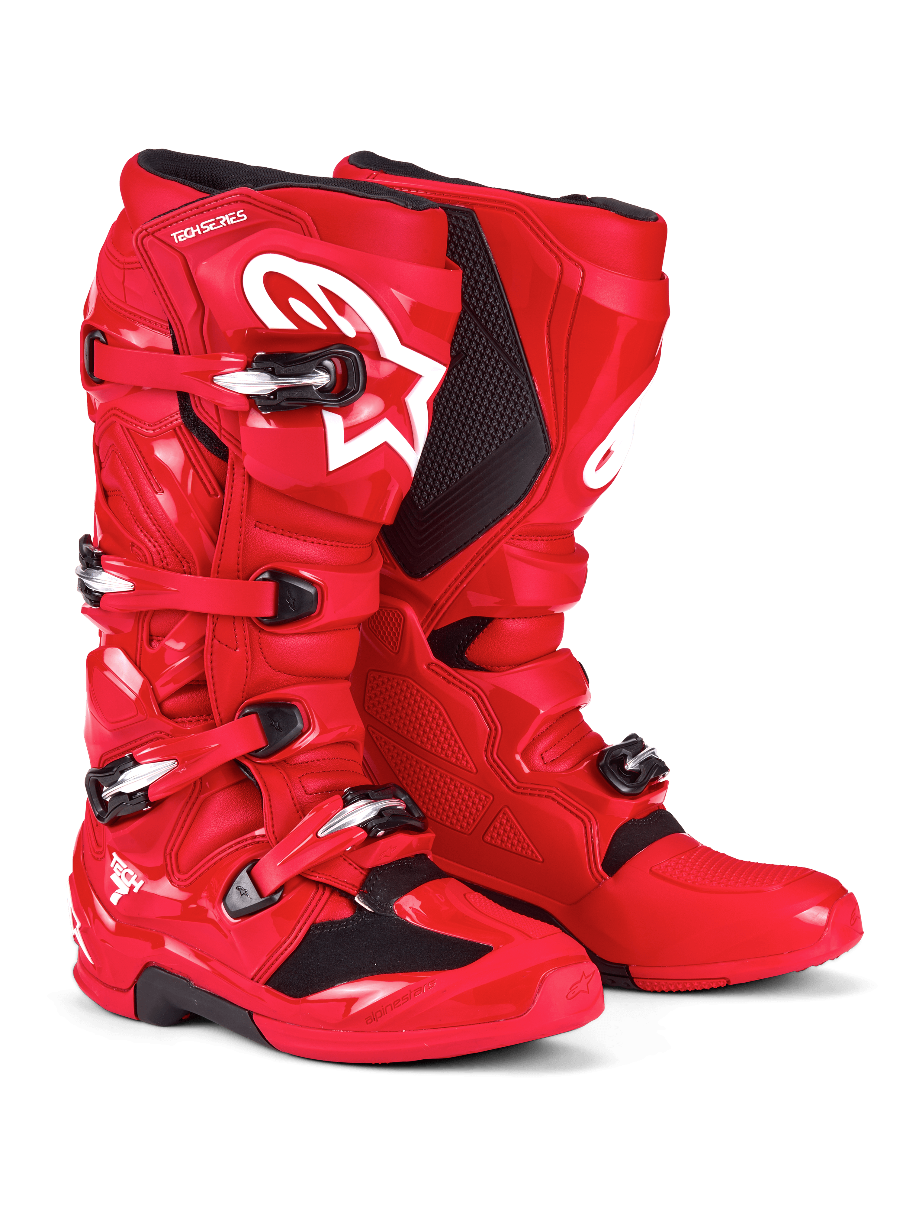 Buty Alpinestars Tech 7, buty motocrossowe, jaskrawoczerwone, z białym logo Astars na goleniu, srebrno-czarnym systemem klamer i ochronną skorupą TPU dla wydajności w terenie