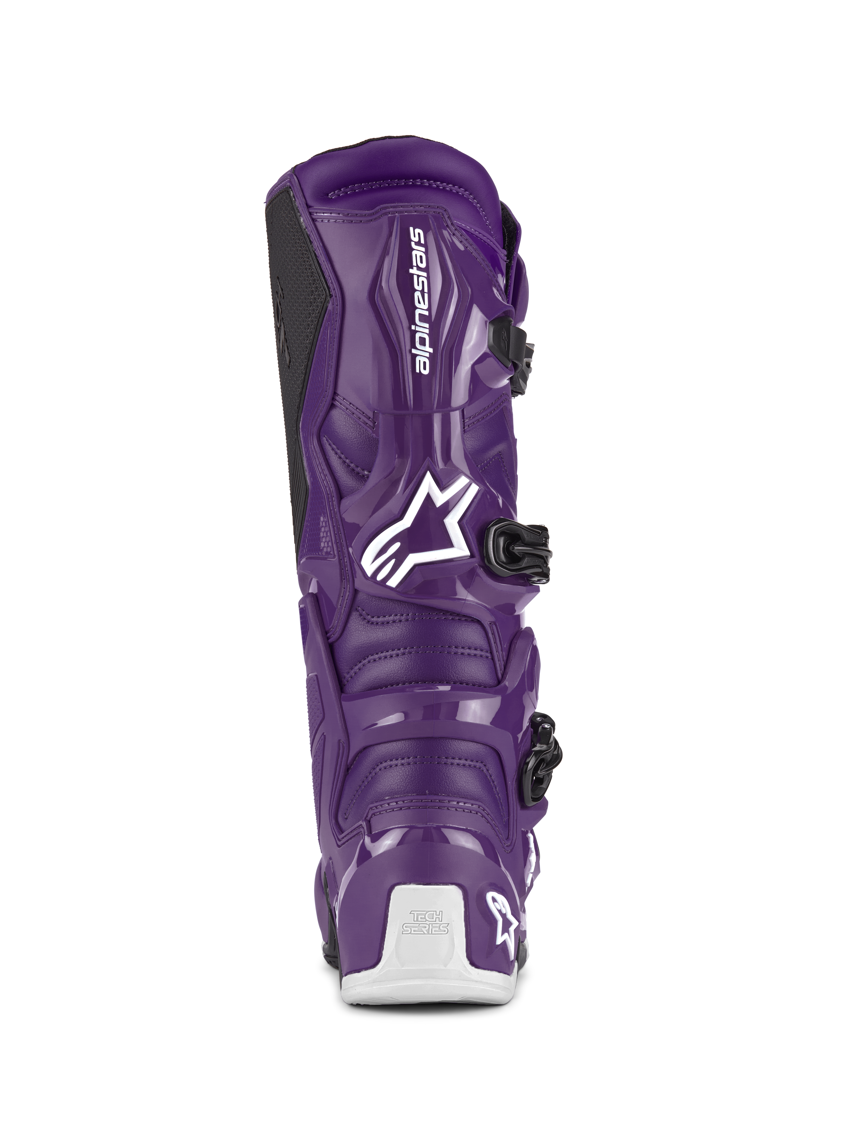 Buty Alpinestars Tech 7, buty motocrossowe, fioletowe, widok z tyłu prezentujący białe logo Alpinestars oraz oznakowanie Tech Series na pięcie, czarne zapięcia na klamry, wytrzymała konstrukcja z TPU i materiałów syntetycznych do jazdy w terenie