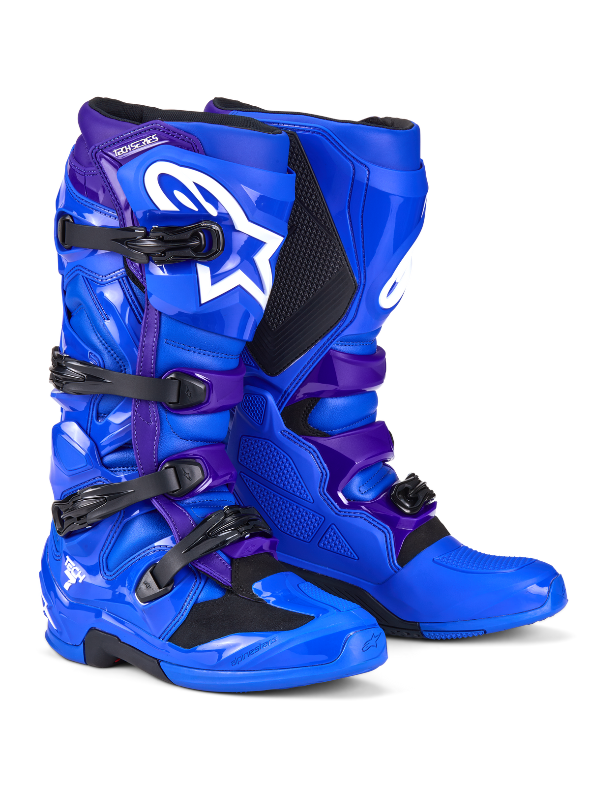 Buty Alpinestars Tech 7, buty motocrossowe, niebieskie i fioletowe, białe logo Alpinestars, panele ochronne TPU, system zapinania na cztery klamry, wytrzymała podeszwa terenowa