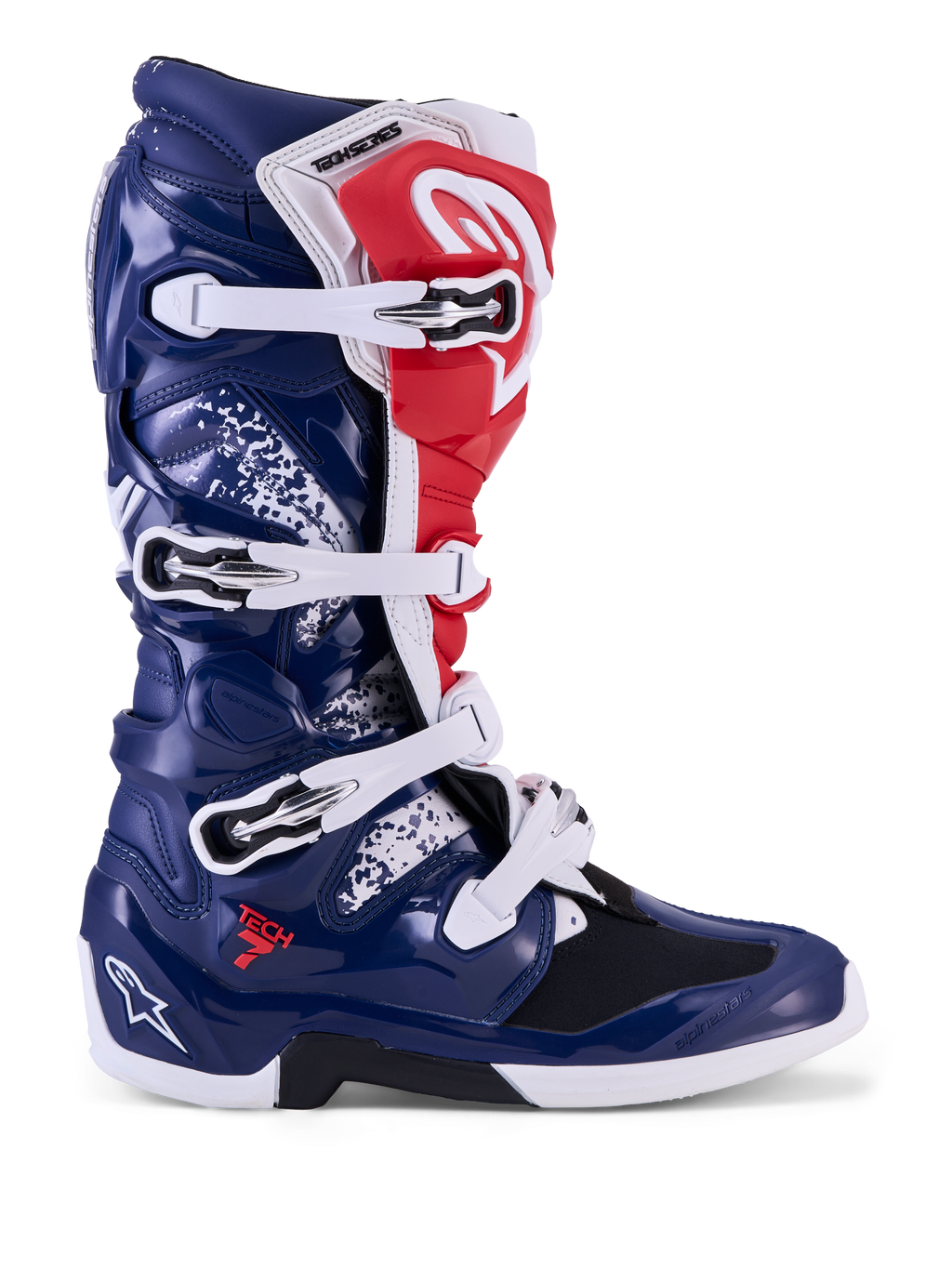 Alpinestars Tech 7 Unity, buty motocrossowe, czerwone, białe i niebieskie, z ochronną osłoną TPU i białymi klamrami.