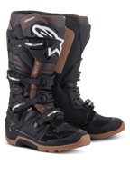 Alpinestars Tech 7 Enduro Boots, Black and Dark Brown, off-road motorcycle boots featuring a white Alpinestars logo on the shin, a four-buckle closure system, and rugged tan soles.