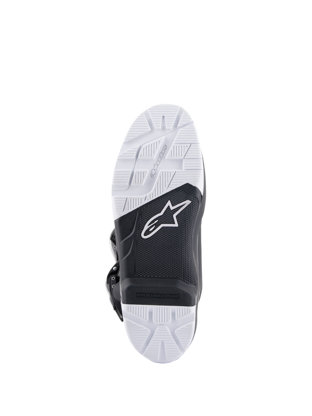 Buty Alpinestars Tech 7 Enduro Drystar®, widok szczegółowy podeszwy, czarno-biała mieszanka gumy o podwójnej gęstości o wysokiej przyczepności, logo Alpinestars, wymienna wkładka podnóżka, zaprojektowane dla trakcji off-road i enduro
