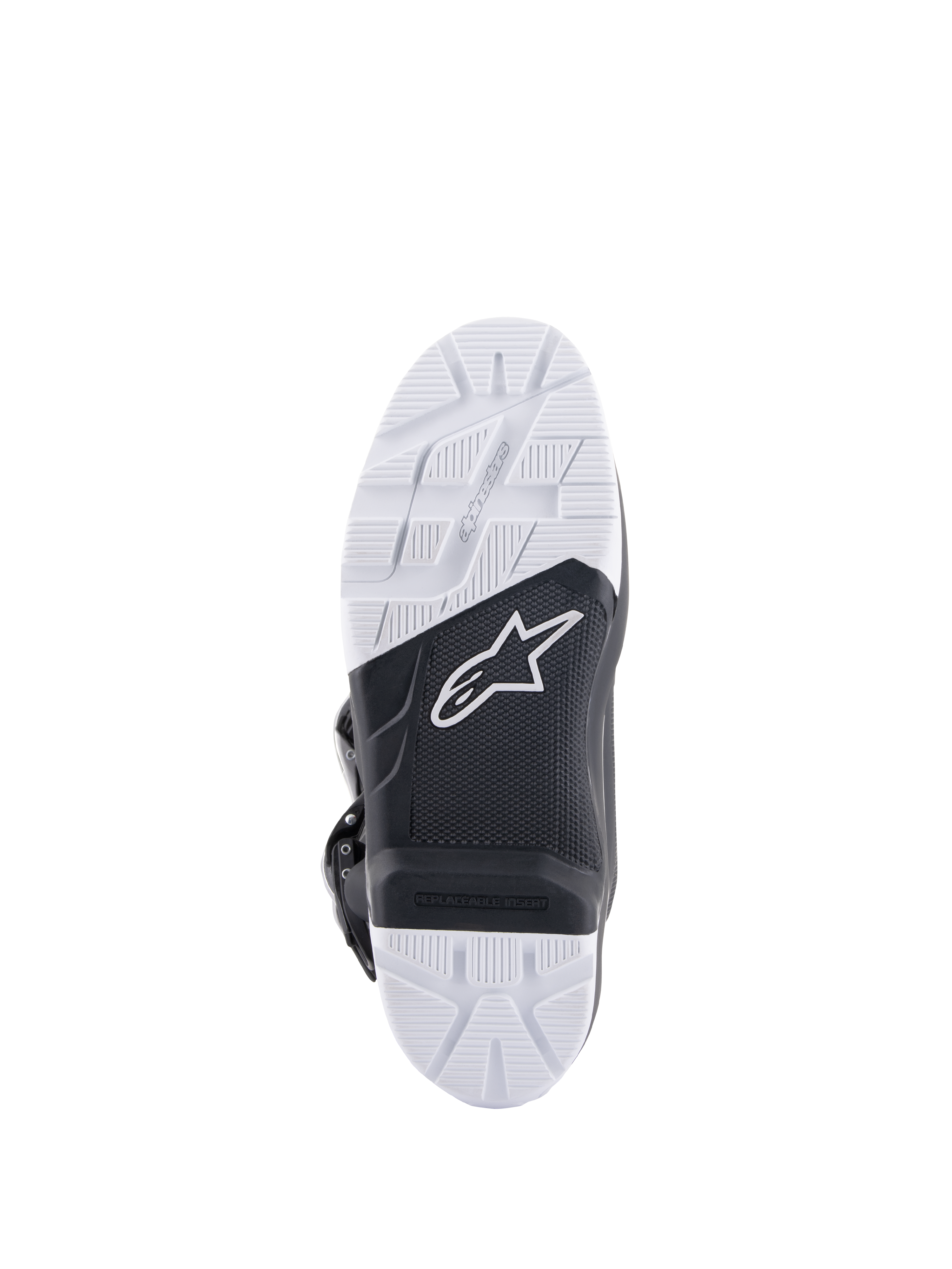 Buty Alpinestars Tech 7 Enduro Drystar®, widok szczegółowy podeszwy, czarno-biała mieszanka gumy o podwójnej gęstości o wysokiej przyczepności, logo Alpinestars, wymienna wkładka podnóżka, zaprojektowane dla trakcji off-road i enduro