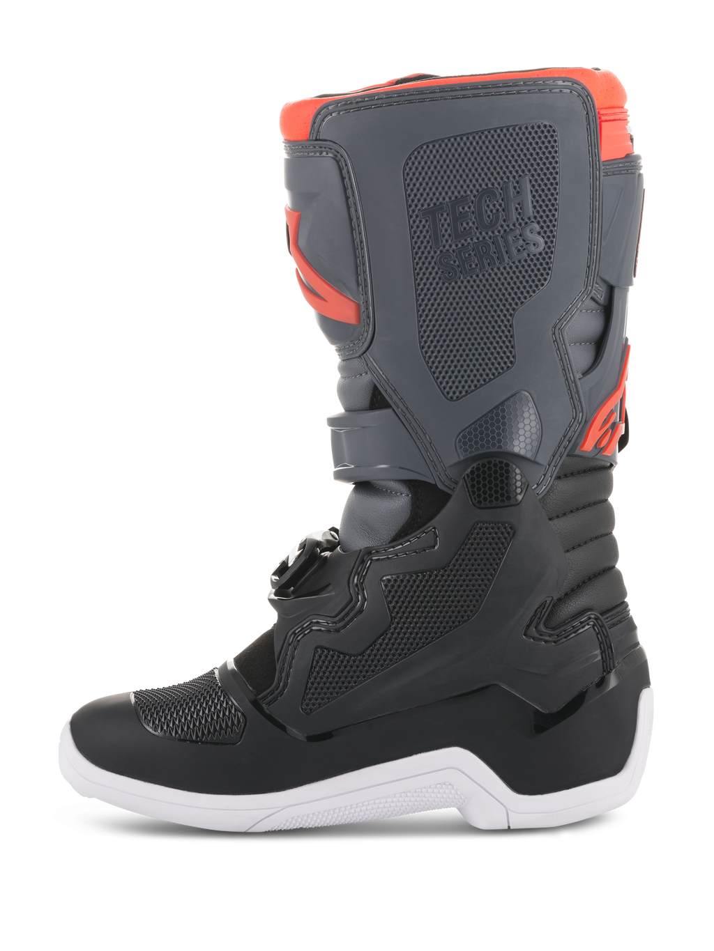 Buty Alpinestars Youth Tech 7S, buty motocrossowe, czarne, ciemnoszare i fluorescencyjne czerwone, widok z boku, ochronne panele TPU, branding Tech Series i biała podeszwa