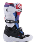 Alpinestars Youth Tech 7S Boots, buty motocrossowe dla młodych kierowców, biało-czarne z czerwonymi, niebieskimi i fioletowymi akcentami, system zapięcia na trzy klamry, ochronne panele TPU i wytrzymała biała podeszwa