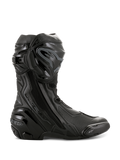 Buty Alpinestars Supertech R, wysokowydajne buty motocyklowe wyścigowe, całe czarne, widok z boku pokazujący ochraniacz piszczeli TPU, wymienny slider palców i wzmocnioną piętę, profesjonalny design gotowy na tor