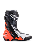 Buty Alpinestars Supertech R, wyczynowe obuwie motocyklowe wyścigowe, czarne, czerwone fluo, białe i szare, widok z profilu prezentujący ochraniacz piszczeli TPU i slider palców, aerodynamiczny design z wyraźnym logo, do użytku na torze i drodze.