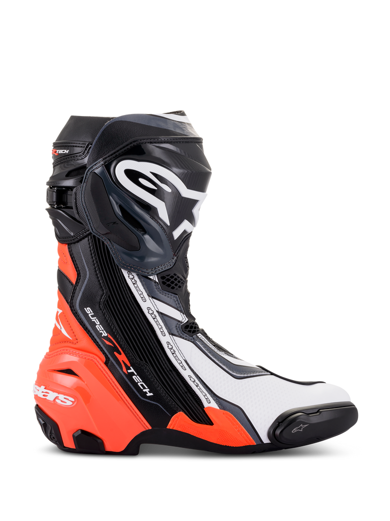 Buty Alpinestars Supertech R, wyczynowe obuwie motocyklowe wyścigowe, czarne, czerwone fluo, białe i szare, widok z profilu prezentujący ochraniacz piszczeli TPU i slider palców, aerodynamiczny design z wyraźnym logo, do użytku na torze i drodze.