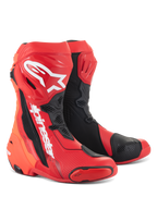 Buty Alpinestars Supertech R, motocyklowe buty wyścigowe, jaskrawoczerwone i czerwone fluo z czarnymi i białymi akcentami, białe logo Alpinestars na goleni, wzmocnione płyty ochronne i wymienne slidery palców, wyczynowe obuwie sportowe i wyścigowe
