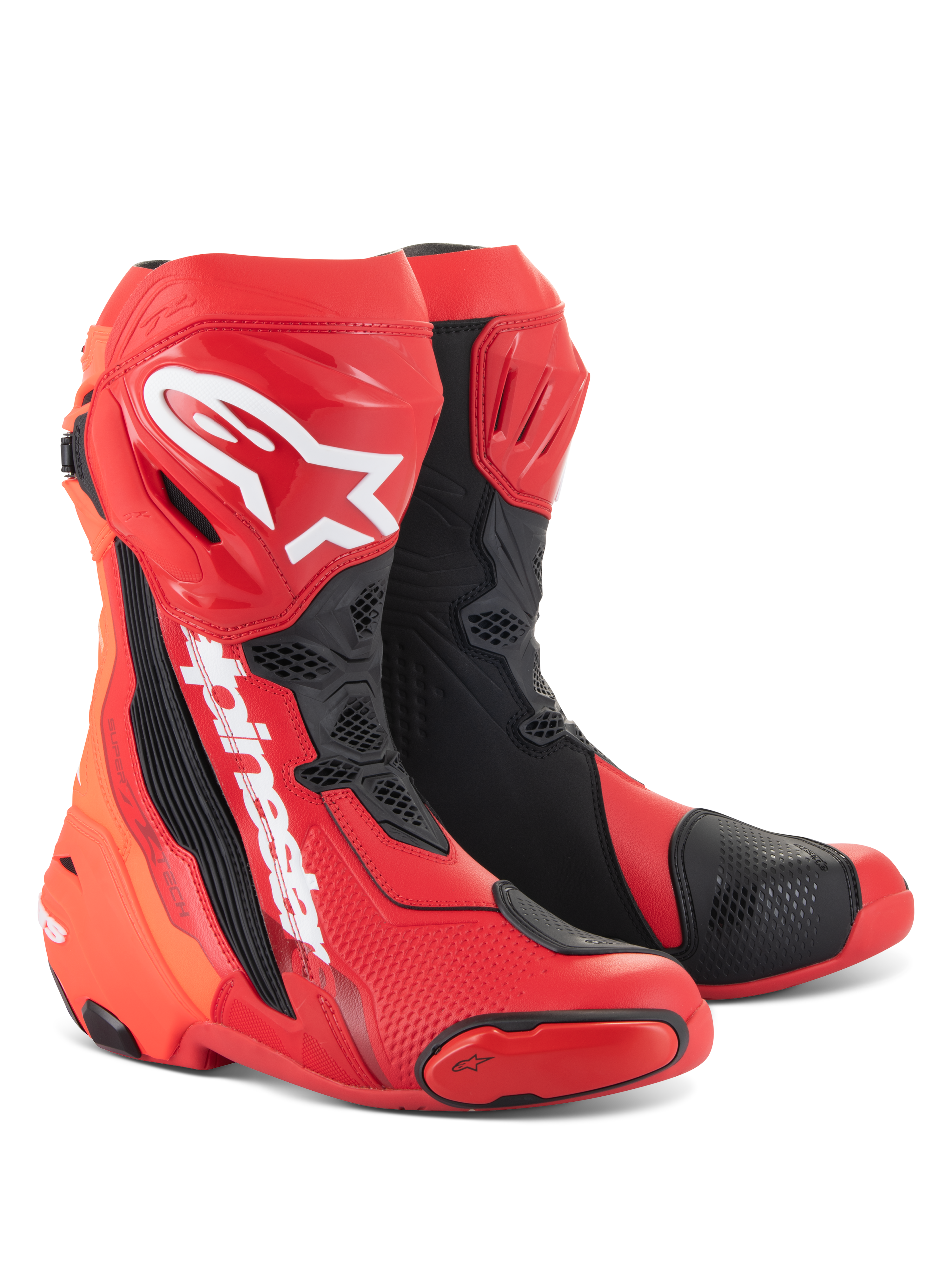 Buty Alpinestars Supertech R, motocyklowe buty wyścigowe, jaskrawoczerwone i czerwone fluo z czarnymi i białymi akcentami, białe logo Alpinestars na goleni, wzmocnione płyty ochronne i wymienne slidery palców, wyczynowe obuwie sportowe i wyścigowe