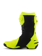 Buty Alpinestars Supertech R, buty motocyklowe wyścigowe, żółte neonowe i czarne, profil boczny z wzmocnioną ochroną goleni i pięty, smukły ergonomiczny design z perforowanymi panelami i brandingiem na pięcie.