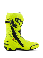 Buty Alpinestars Supertech R, motocyklowe buty wyścigowe, żółty fluo i czarny, widok z boku prezentujący intensywny neonowy żółty z czarnymi płytami ochronnymi, branding Alpinestars na goleni i pięcie, smukły profil aerodynamiczny do jazdy wyczynowej