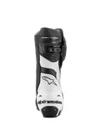 Buty Alpinestars Supertech R Vented, motocyklowe buty wyścigowe, czarno-białe, widok z tyłu przedstawiający białe panele z perforowanej mikrofibry, czarny ochraniacz pięty z TPU z logo Alpinestars oraz regulowany system zapięcia