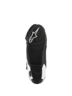 Alpinestars Supertech R Vented Boots, motocyklowe buty wyścigowe, czarno-białe, widok podeszwy od dołu z teksturowaną gumową strukturą i białym logo Alpinestars