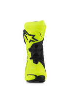 Buty Alpinestars Supertech R Vented, wyścigowe buty motocyklowe, kolor żółty fluo i czarny, widok z przodu przedstawiający perforowaną mikrofibrę, płytę goleniową TPU z czarnym logo gwiazdy i siatkę wentylacyjną dla maksymalnego przepływu powietrza.