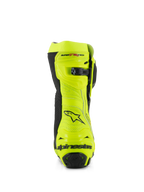Buty Alpinestars Supertech R Vented, widok z tyłu, żółte neonowe i czarne, konstrukcja z perforowanej mikrofibry, mikroregulowane zapięcie zapadkowe na górze, czarne logo Alpinestars na pięcie, profesjonalne obuwie wyścigowe