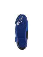 Buty Alpinestars Supertech R Vented, niebiesko-czarne, widok od dołu na niebieską gumową podeszwę z białym logo Astars, teksturowany wzór przyczepności ułatwiający kontrolę nad podnóżkami, wysokowydajne obuwie do wyścigów motocyklowych