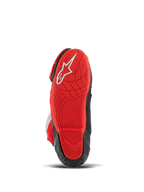 Alpinestars Supertech R LE Pecco Bagnaia Vented Boots, buty motocyklowe wyścigowe, czerwono-czarne, widok od dołu przedstawiający czerwoną gumową podeszwę z białym logo i teksturowanym bieżnikiem zapewniającym przyczepność