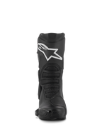Buty Alpinestars Stella SMX-6 V3, damskie wyczynowe buty motocyklowe, czarne z białym logo Alpinestars, widok z przodu z ochraniaczem goleni TPU i elastycznymi strefami z siatki, wytrzymała konstrukcja z mikrofibry.