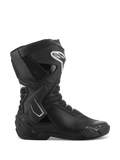 Buty Alpinestars Stella SMX-6 V3, damskie motocyklowe buty sportowe, czarno-białe, widok z boku przedstawiający stabilizator kostki TPU i ochraniacz goleni, oddychające panele z siatki, białe logo Alpinestars z przodu, zaprojektowane do jazdy na torze i ulicy