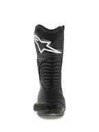 Buty Alpinestars SMX S, czarne buty motocyklowe, widok z przodu ukazujący duże białe logo Alpinestars na ochraniaczu goleni, elastyczne panele harmonijkowe oraz trwałą konstrukcję z mikrofibry z ochronnymi osłonami PU