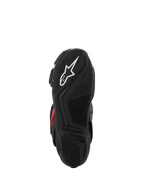 Buty Alpinestars SMX-6 V3 Drystar®, widok podeszwy, czarna teksturowana guma zapewniająca przyczepność, białe logo gwiazdy i wytłaczany napis Alpinestars, profesjonalne obuwie motocyklowe